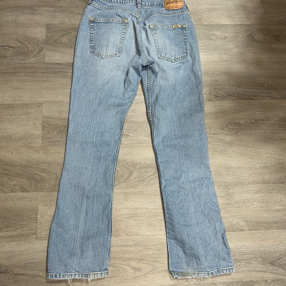 Levi's 515 Bootcut Jeans in a light-wash blue denim finish. Misses 4 short - Picture 2 of 7